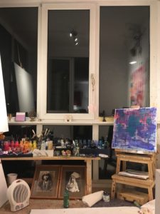 Sources of light, art supplies, makeshift easel